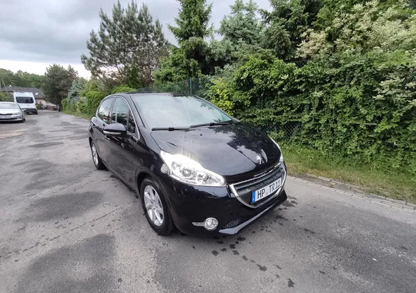 śląskie Peugeot 208 cena 34999 przebieg: 70302, rok produkcji 2015 z Skoczów